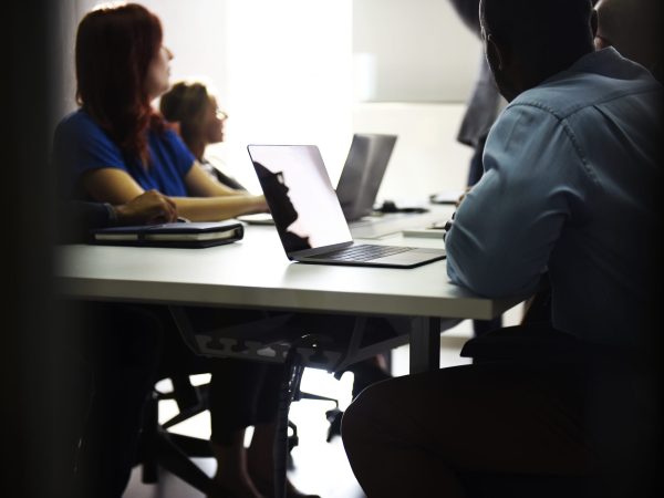 Group of diverse people attending startup business course